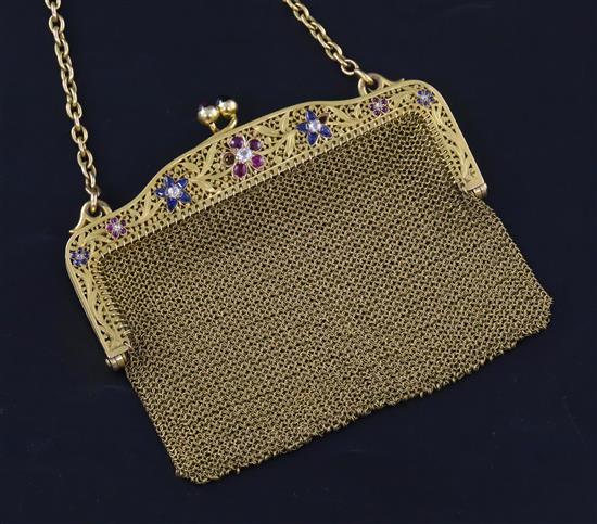 A French pierced 18ct gold, ruby, sapphire and diamond mesh evening purse, width 10cm.